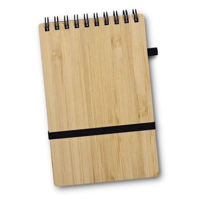 A bamboo note pad with a spiral binding and an elastic band closure, featuring a natural wooden finish.