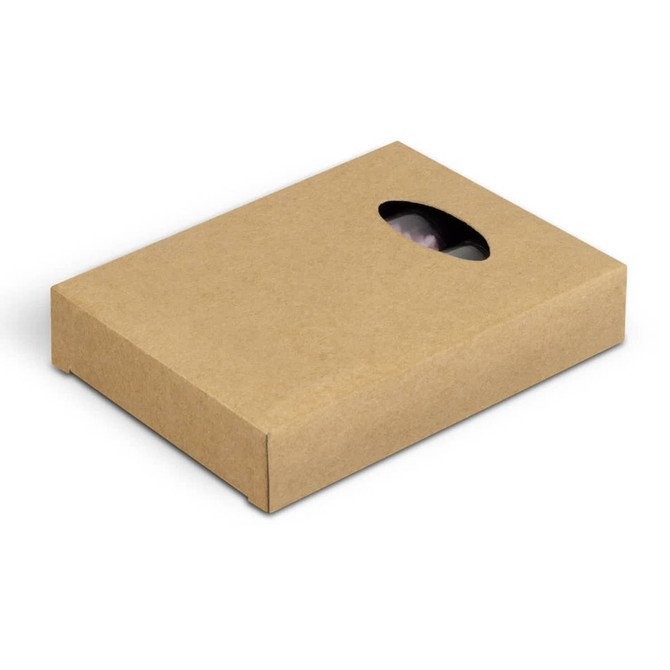 A brown cardboard box containing a spa bath salt set, featuring a window to view the contents inside.