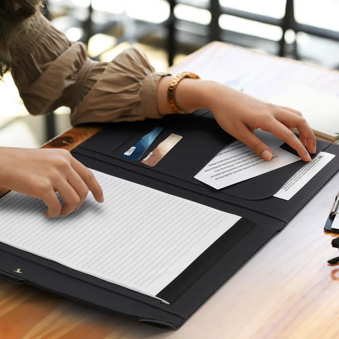 A black portfolio folder featuring a sleek design and an embossed logo. Ideal for office use.