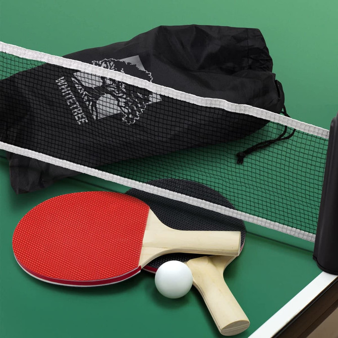 A portable table tennis set featuring red and black paddles, a white ball, and a net in a black carry bag.