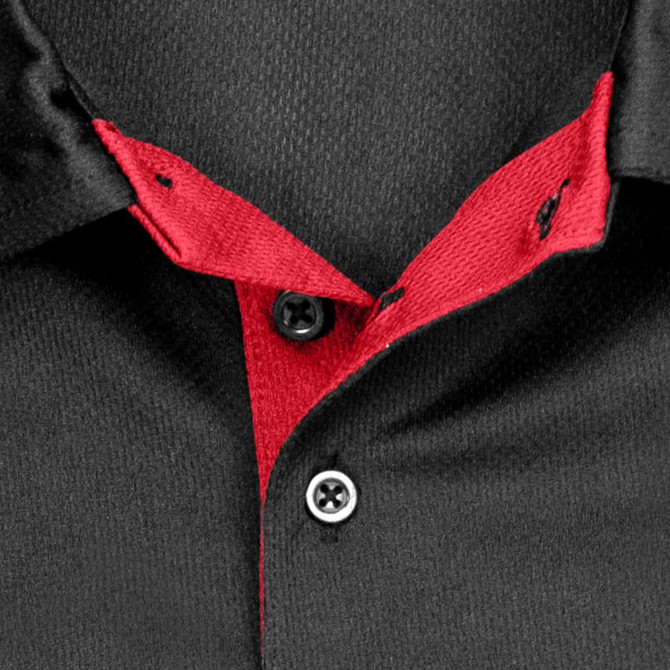 Close-up of a black polo shirt featuring a red collar and button detail, with a logo present.