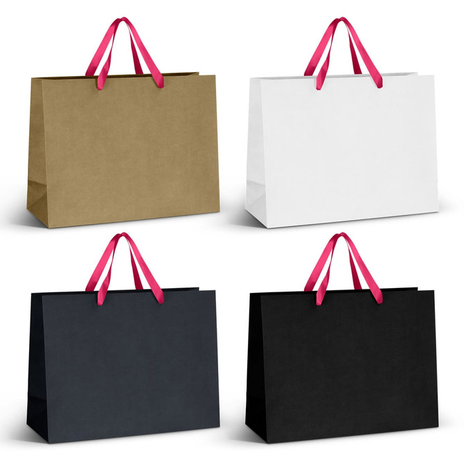 A set of four extra large ribbon handle paper bags in gold, white, black, and dark black, each with pink handles.