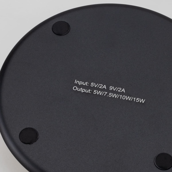 A Bamboo 15W wireless fast charger in a sleek black design, featuring a smooth surface and rubberised base for stability.