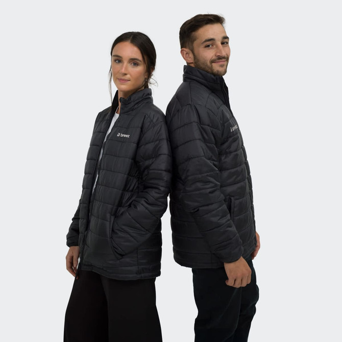 A black puffer jacket featuring a logo, worn by two people standing back to back.
