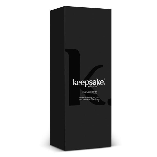 A black box with the Keepsake Bohemia Burner inside, featuring branding elements on the package.