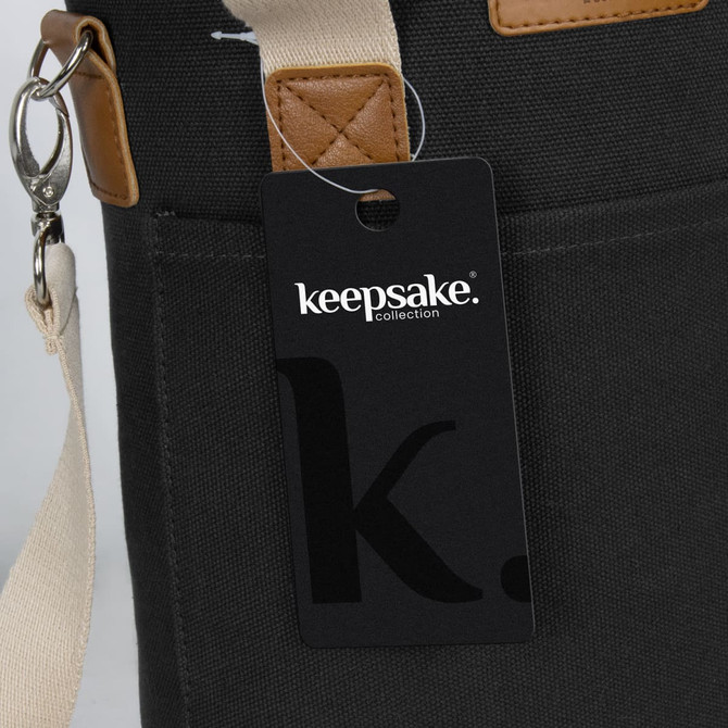 A drink bottle cooler bag in dark grey with tan accents and a tag featuring a logo.