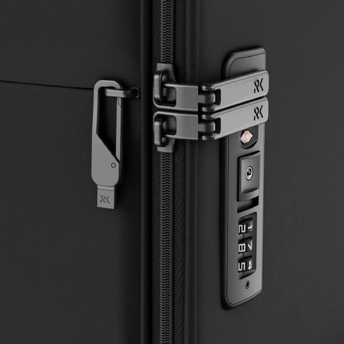 A black wheeled suitcase featuring dual zippers, a combination lock, and a logo detail.