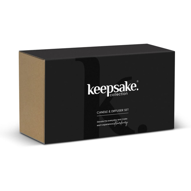 A black and brown packaged candle and diffuser set, featuring a logo on the front.