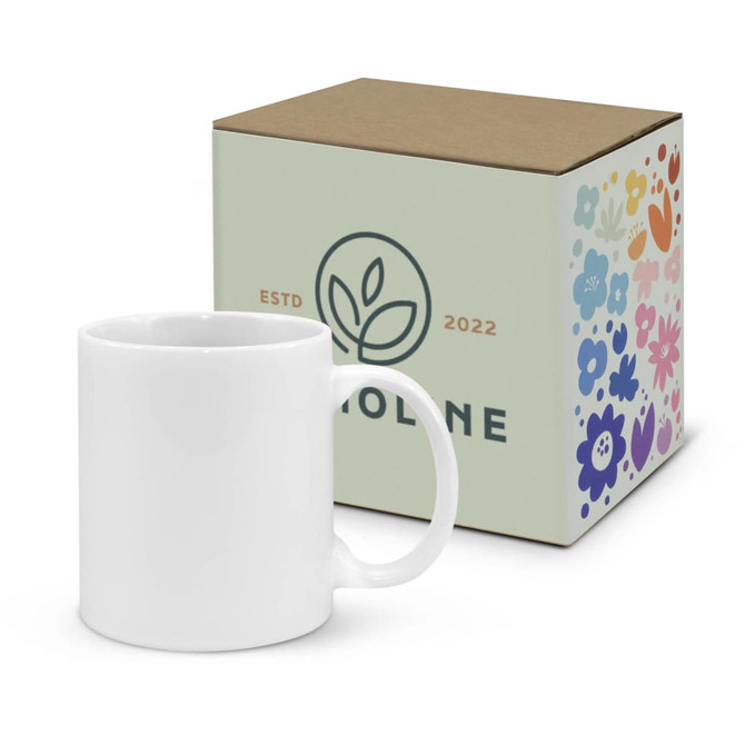 A white coffee mug next to a decorative box featuring floral designs and a logo.