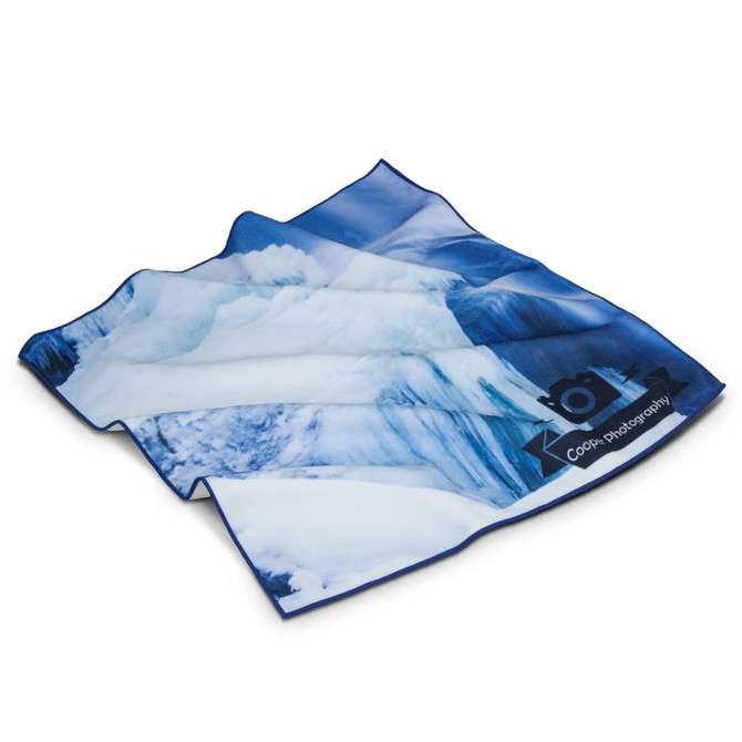 A large magic cover featuring a blue and white ice-themed design, with a logo on one side.