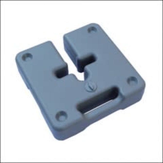 A weight base in grey, designed for stability, featuring cutouts and handles for easy handling.