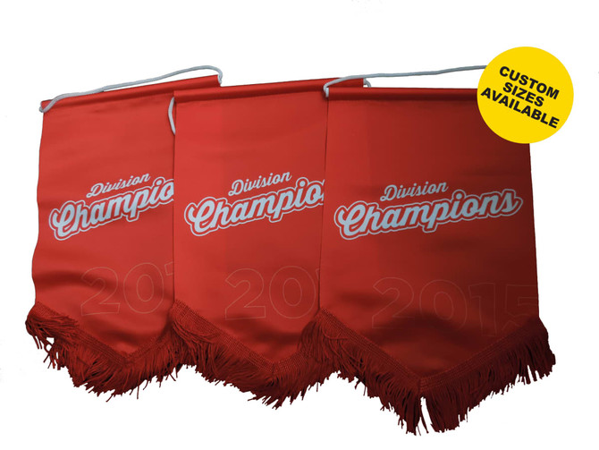 Three red pennants with white text and fringes, featuring a logo and a design indicating division champions.