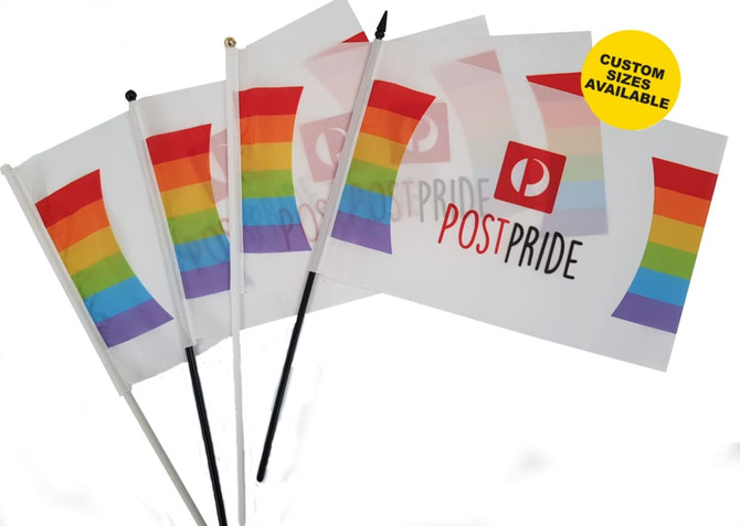 Three double-sided polyester flags with rainbow stripes and a branding logo, featuring black and gold poles.
