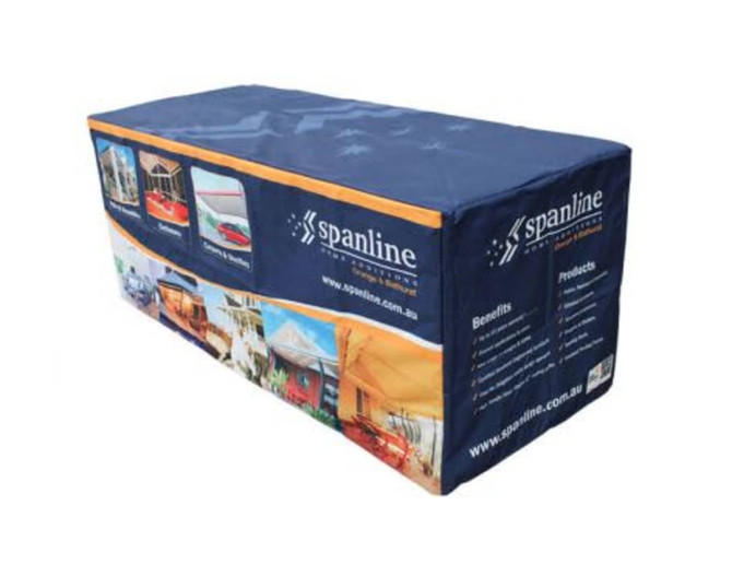 A 4-foot table cover in blue and orange, featuring various images and a logo on the side.