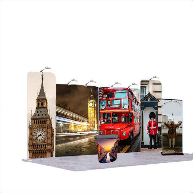 A tension fabric display booth featuring London-themed graphics, including Big Ben and a red double-decker bus, with a circular counter.