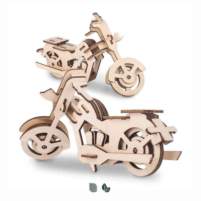 Two wooden motorcycle models constructed from light brown plywood, featuring intricate cut-out designs.