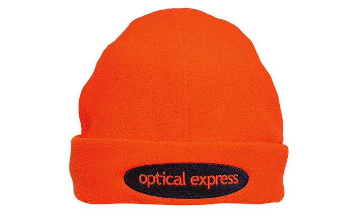 An orange beanie featuring a black logo. The beanie has a fold-up cuff style.