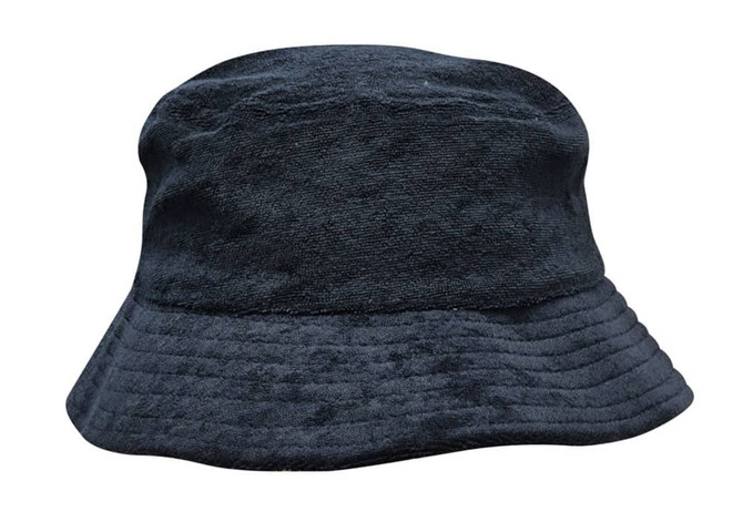 A terry towelling bucket hat in dark blue with a textured surface and wide brim. It has a branding logo.