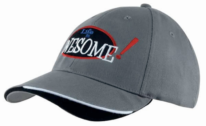 A grey cap featuring an indented peak and a logo. The cap has contrasting accents and stylised text.