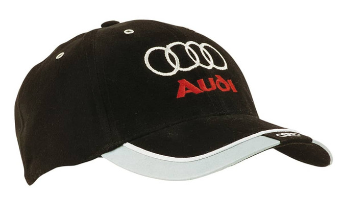 A black cap with a white reflective trim and tab on the peak, featuring a logo on the front.