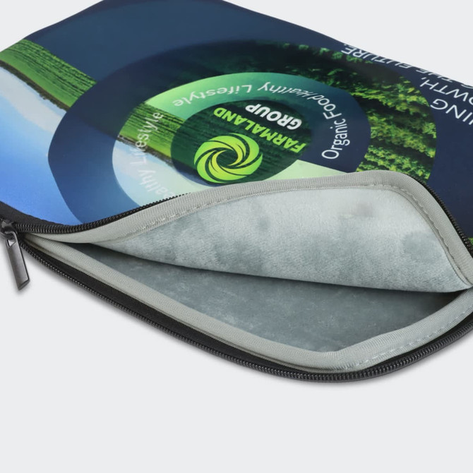 A small, full-colour laptop sleeve featuring a vibrant design and a soft interior lining, with a logo present.