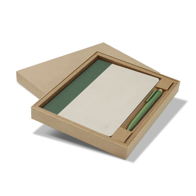 A green and cream notebook with a matching pen inside a cardboard gift box. The set is neatly arranged and closed.