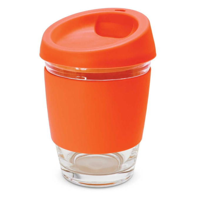 A drink bottle with a clear glass base and an orange silicone lid and sleeve, featuring a small opening for sipping.