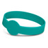 A teal silicone wristband with a debossed design and a circular indent.