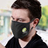A reusable 3-ply cotton face mask in black, featuring a logo on the side, worn by a person.
