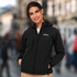A black women's softshell jacket with a hood and a zippered front, featuring a logo on the chest.