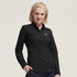 A black women's long sleeve button-up shirt featuring a logo, designed for a smart-casual look.