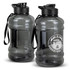 A drink bottle in smoky grey with a black lid and strap, featuring a logo on one side.