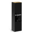 A tall black box containing a Keepsake Pepper Mill, featuring a logo and minimalistic design.