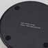 A Bamboo 15W wireless fast charger in a sleek black design, featuring a smooth surface and rubberised base for stability.
