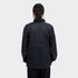 A black unisex windbreaker jacket with a relaxed fit and a logo on the back.