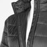 A black unisex puffer jacket featuring a high collar and zip closure, displayed against a white background.