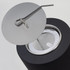 A sleek, black drink bottle with a stainless steel lid and a curved straw attachment.