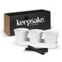 A white herb planter set with three pots and a tray, packaged in a black box with a logo.