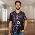A man wearing a black and purple custom sports V-neck T-shirt with a logo. The shirt features a bold, modern design.