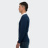 A navy unisex rugby jersey featuring a white collar, designed as part of a sports uniform. It has a logo.