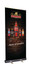 A pull-up banner featuring various beer bottles against a dark background, with a sleek silver base and logo at the top.