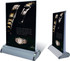 A double sided pull-up banner with a sleek silver base, featuring a black background and an image of a watch.