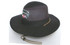 A black twill and mesh hat with a wide brim and a logo on the front, featuring a brown chin strap.