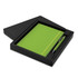 A green notebook and pen gift set displayed in a black box, featuring a sleek design.