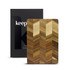 A wooden chopping board with a chevron pattern, packaged in a branded box.