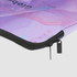 A large laptop sleeve in shades of purple with a stylish pattern and a black zip. It features a logo.