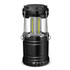 A black COB lantern with a transparent body and dual light strips, featuring a sturdy design and handle for carrying.