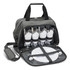 A grey picnic bag opened to reveal dinnerware, including forks, knives, plates, and glasses, neatly organised inside.