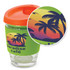 A drink bottle featuring a clear glass body, orange lid, and green silicone sleeve with a tropical palm design.