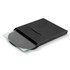 A square, clear glass coaster partially displayed in a black packaging box. The box has a sleek, minimalist design.